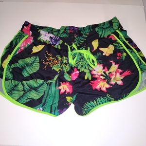 Tropical print shorts.